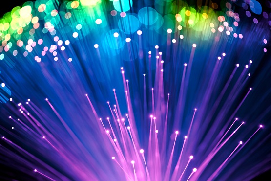 Fiber optics abstract background. Defocused lights and lines create the motion blur effect.